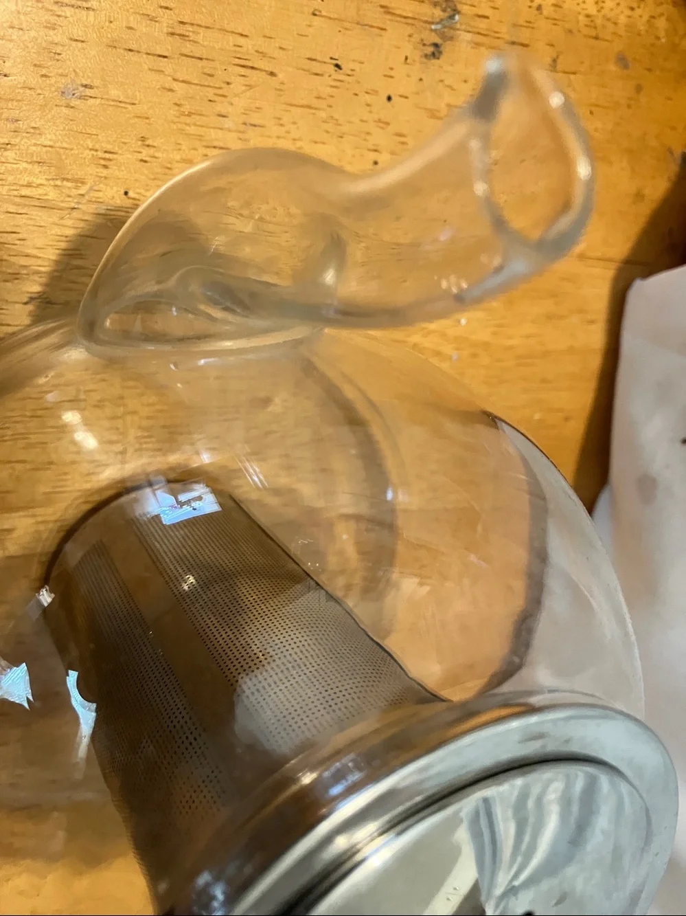 Like new. French press style glass tea pot with stainless steel pieces
